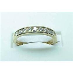 Lady's diamond channel set band .31Ctw 14kt yello