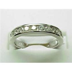 Lady's 14kt white gold channel set diamond band .