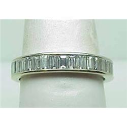 Lady's 14kt white gold channel set baguette diamo