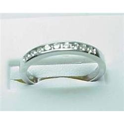 Lady's 14kt white gold channel set diamond band .