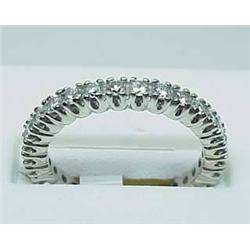 Lady's 14kt white gold prong set eternity band 1.