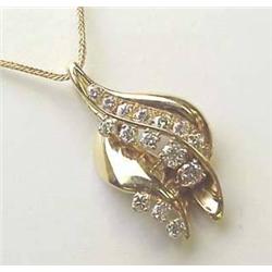 14kt yellow gold diamond pendant approx 1Ctw on a