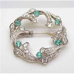 Antique circle pin with approx 1Ctw diamonds and 