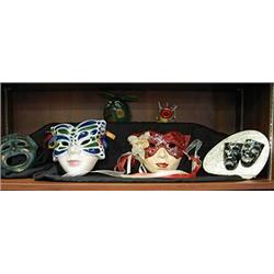 Six colorful decorative masks made of various mat