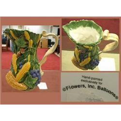 9 1/2" tall hand painted vegetable pitcher in goo