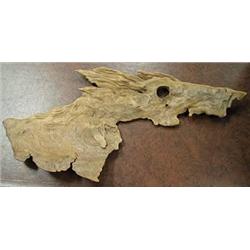Large natural piece of driftwood in the shape of 