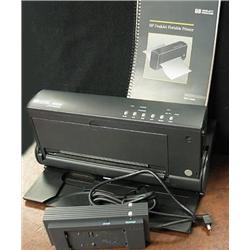 HP Deskjet portable Printer.  Has a manual.  Not 