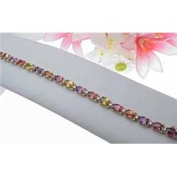 Multi-colored sapphire 13.20Ctw and diamond .83Ct