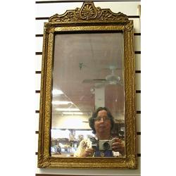 Nice vintage wall mirror measuring 24 1/2 tall.  