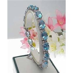 14kt white gold blue topaz 23.53Ctw and diamond 1