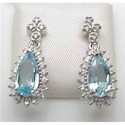 Blue topaz 3Ctw and diamond .25Ctw dangle earring