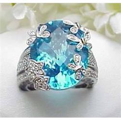 Lady s ring with 22.2Ct blue topaz and .48Ctw dia