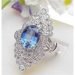 Lady s 14kt white gold ring with 3.68Ct oval tanz