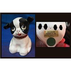 4 3/4 tall iron bank in the likeness of a puppy. 