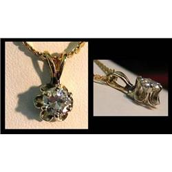 Diamond solitaire pendant approx .55Ct  small chi