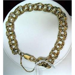 14kt yellow gold charm bracelet 18.7gr