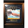Image 1 : MICHAEL PHELPS SIGNED 2008 BEIJING SUMMER OLYMPIC GAMES 32' X 36' FRAMED PHOTO