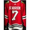 Image 1 : BRENT SEABROOK SIGNED BLACK HAWKS JERSEY (FRAMEWORTH HOLO)