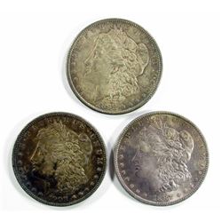 3- TONED UNC MORGAN DOLLARS