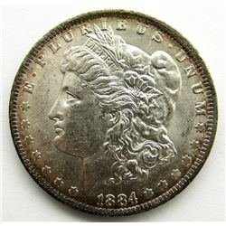 1884-O MORGAN DOLLAR BU RIM TONED