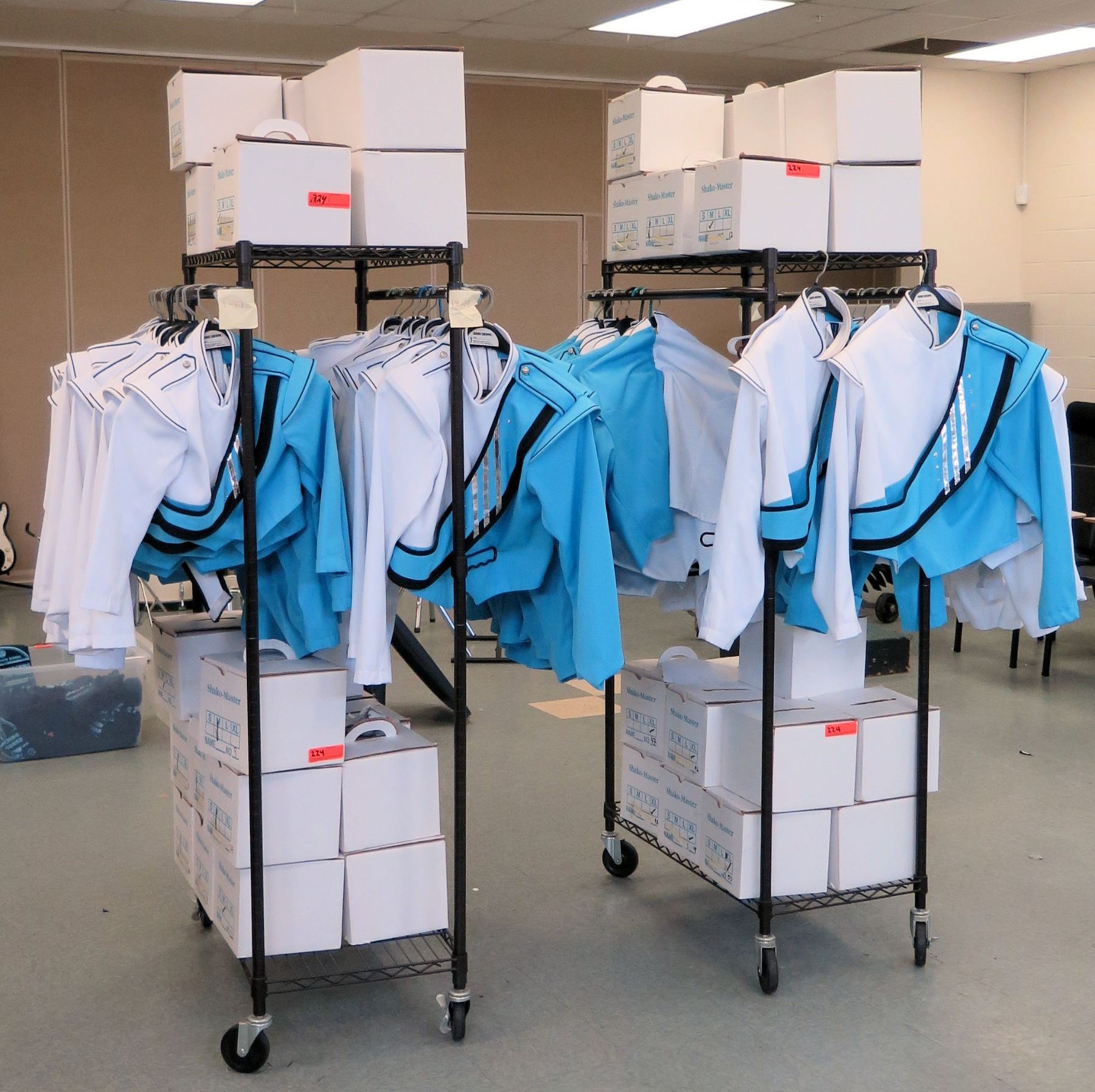 Rolling Racks w/ Marching Band Uniforms (approx. 49) & Hats (approx 48 ...