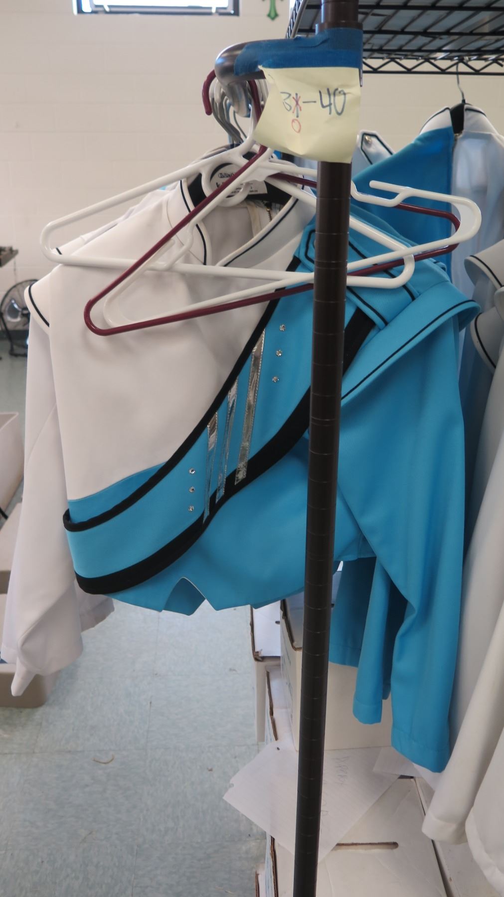 Rolling Racks w/ Marching Band Uniforms (approx. 49) & Hats (approx 48 ...
