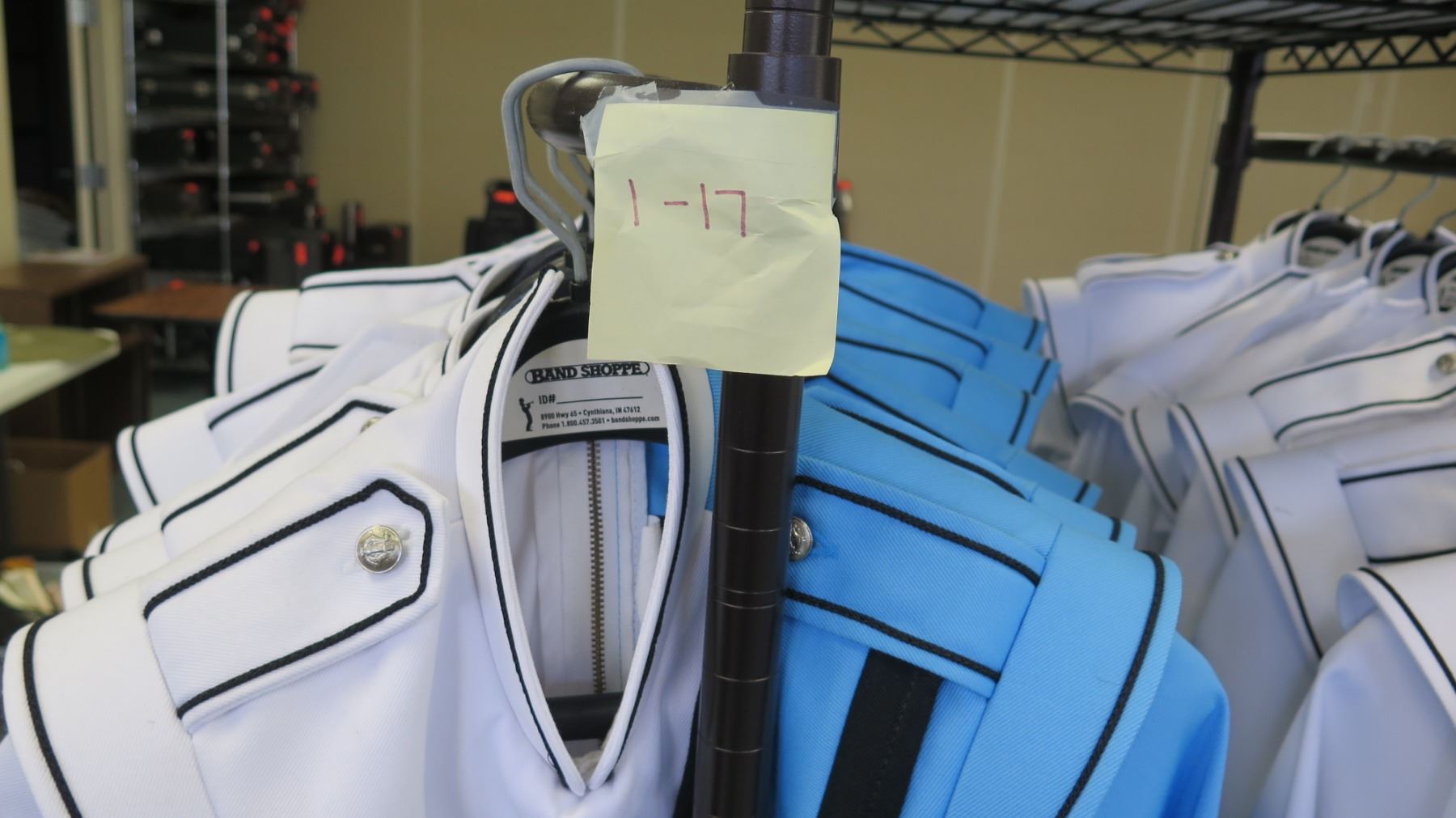 Rolling Racks w/ Marching Band Uniforms (approx. 49) & Hats (approx 48 ...