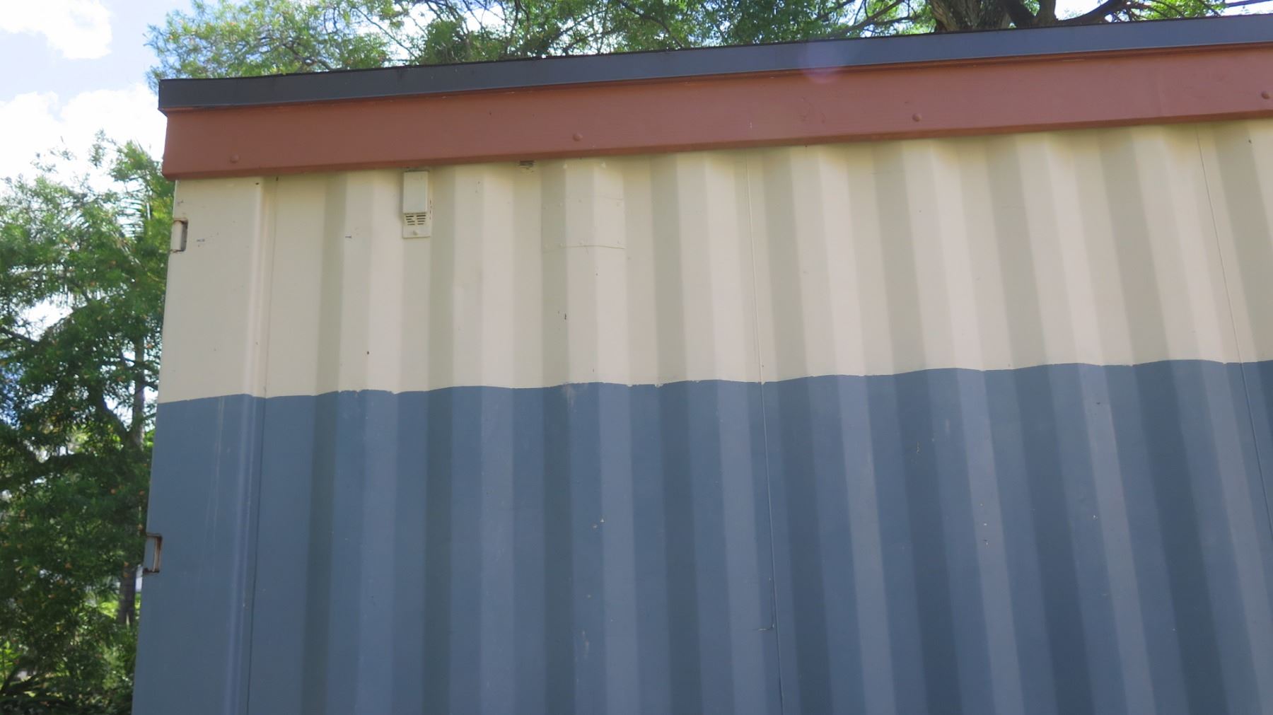 Shipping Container (has rust, roof leaks)