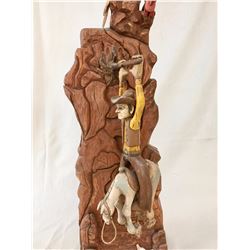 “Hang in There” Wood Carving