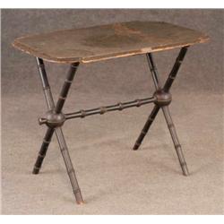 VICTORIAN JAPANNED LIBRARY TABLE bearing a plaque