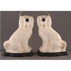 PAIR OF STAFFORDSHIRE SPANIELS adapted to lamps, 