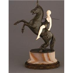 ART DECO BRONZE AND IVORY FIGURE ON A HORSE, unsi