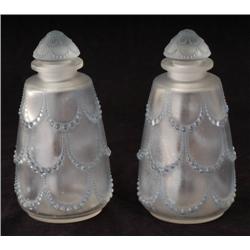 PAIR OF LALIQUE BOTTLES with applied beaded swags