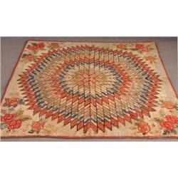 HOOKED RUG with floral sprays at corners 69"x69",