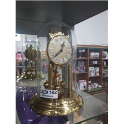 300 DAY CLOCK AND LARGE PURPLE GLASS VASE
