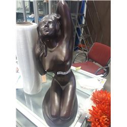BROWN STATUE OF FEMALE FORM