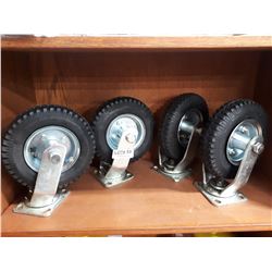 FOUR OVERSIZED CASTOR WHEELS