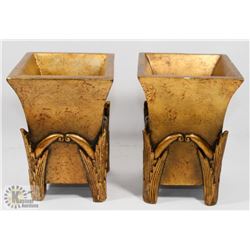 2 GOLD CANDLE HOLDERS