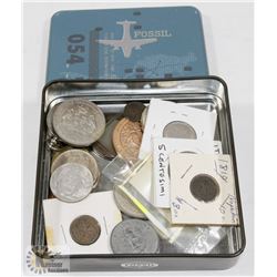 FOSSIL BOX FULL OF  ASSORTED WORLD COINS