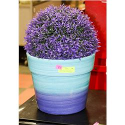 PURPLE AND BLUE POT WITH PURPLE FLORAL ARRANGEMENT