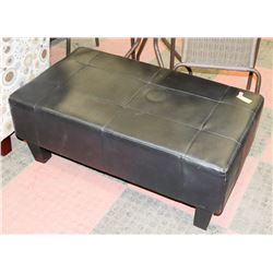 BLACK LEATHERETTE OTTOMAN 39"X22"X15".
