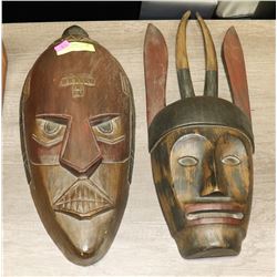PAIR OF WOODEN MASKS