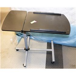 ADJUSTABLE TV/COMPUTER TABLE ON WHEELS