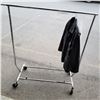 Image 2 : ROLLING CLOTHING RACK AND 2 JACKETS