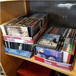 3 BOXES OF DVDS