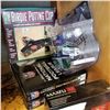 Image 2 : 2 NFL BOOKS, PUTTING CUP, HOCKEY FIGURE, GOLF BALLS, AND DRONE