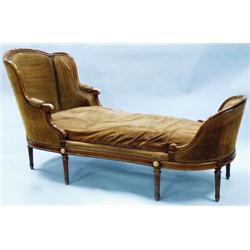 An antique French Louis XV style carved fruitwood