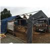 Image 1 : 20' X 12' METAL FRAMED SHELTER (METAL FRAME AND WHAT'S LEFT OF COVERINGS)