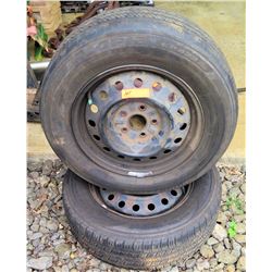 2-5x4.25x16 stock steel rims with 215/65R16 tires approx. 60% tread