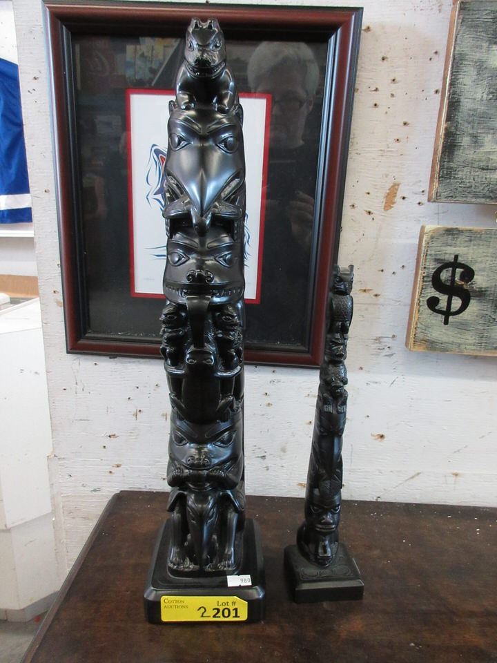 Two Boma Canada Totem Statues
